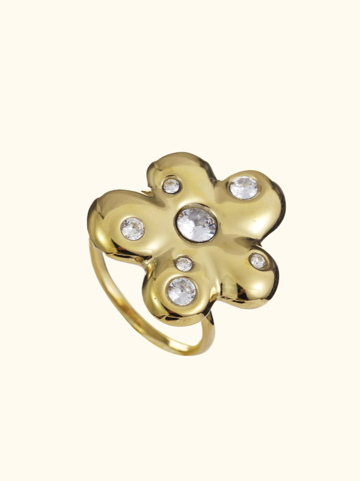 Statement ring met bloem en steentjes